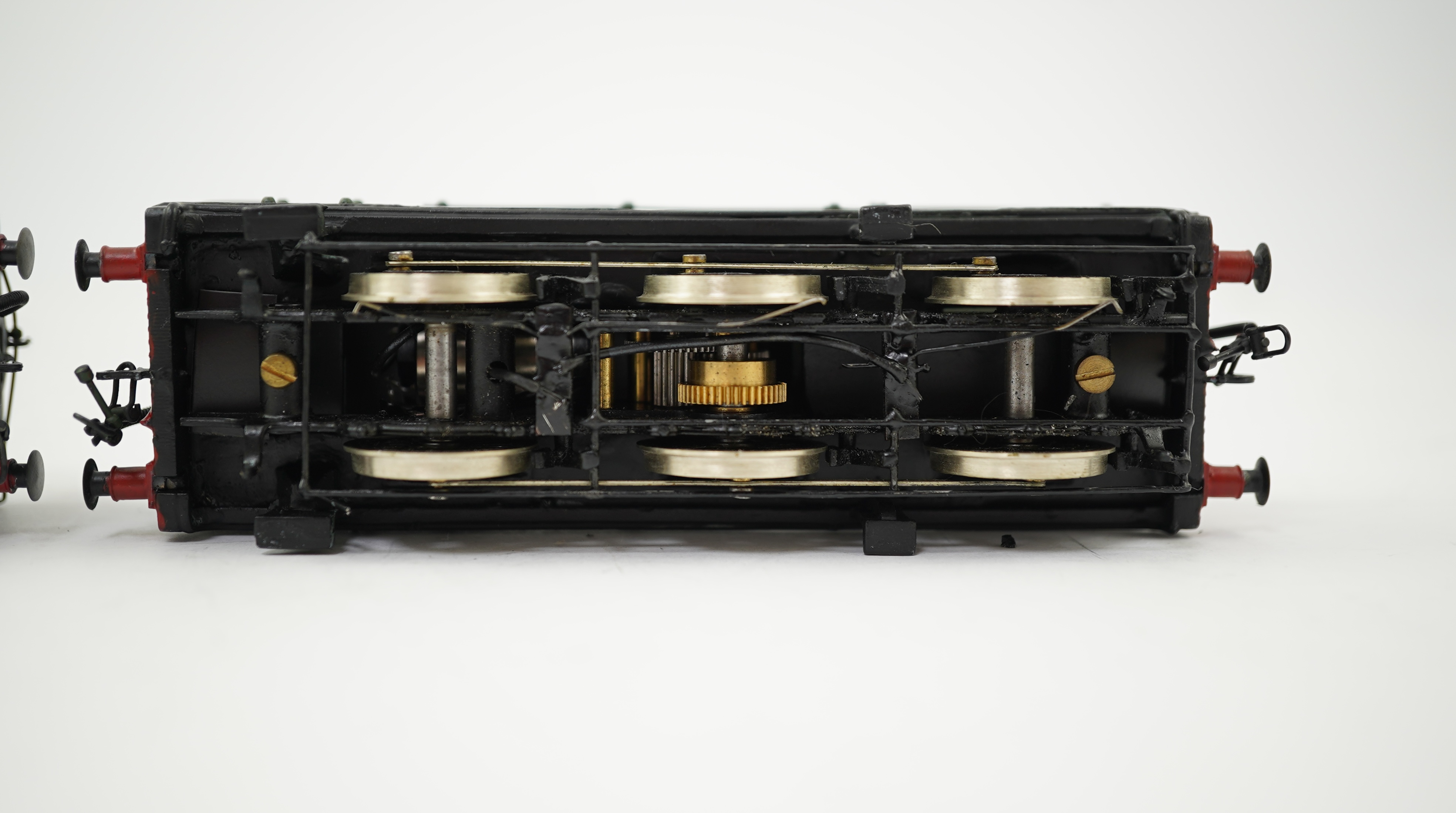 Two 00 gauge brass and white metal kit built GWR Pannier Tank locomotives; a 1600 class 0-6-0PT, 1600, together with an 7400 class 0-6-0PT, 7404, constructed, painted and lined to a high standard, both motored for two ra